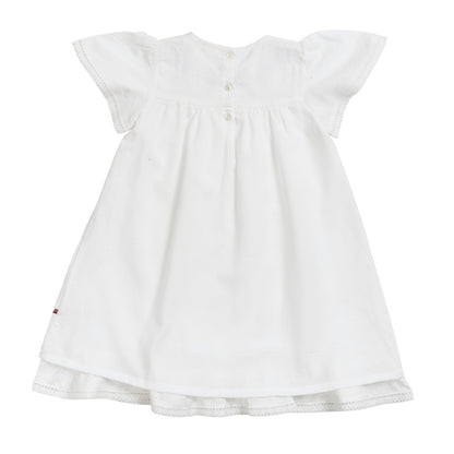 Vestido Blanco con Flor azul